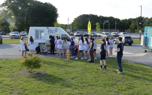 Seniors lined up for the food trucks, tickets in hand.